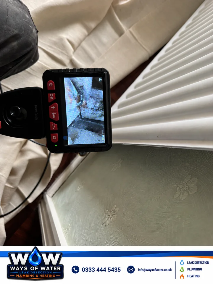 Borescope monitor showing concealed heating pipework